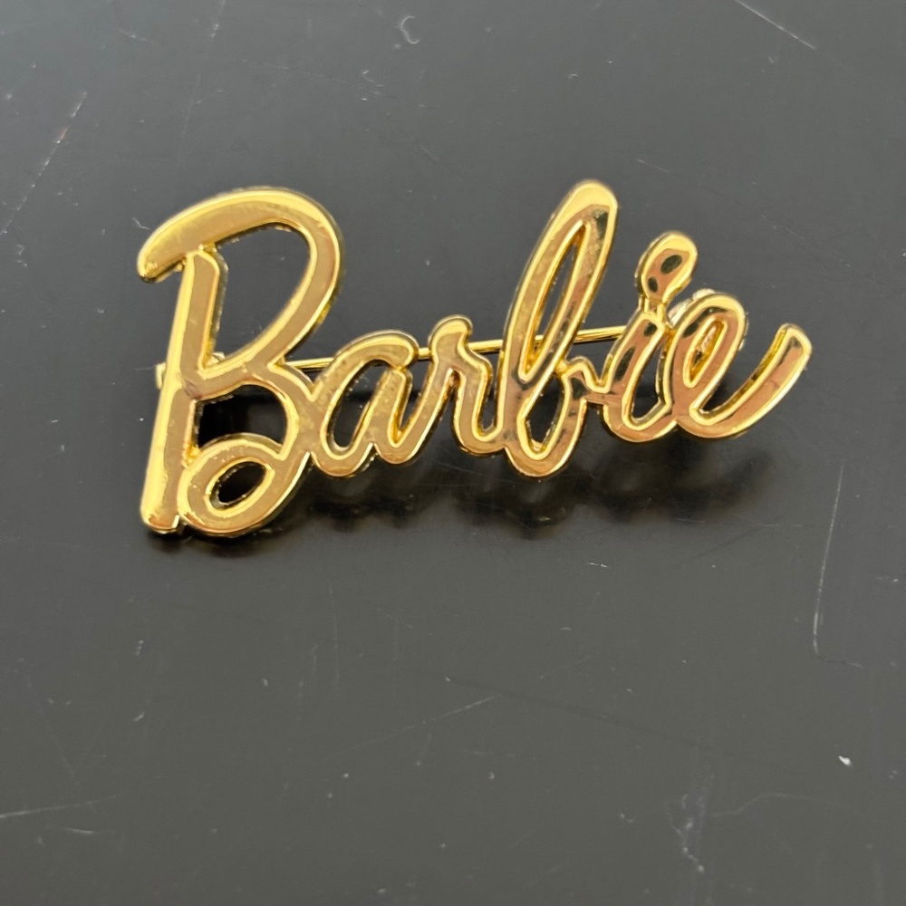 Barbie Brooch Pin Spellout Metallic Gold Tone Doll Logo